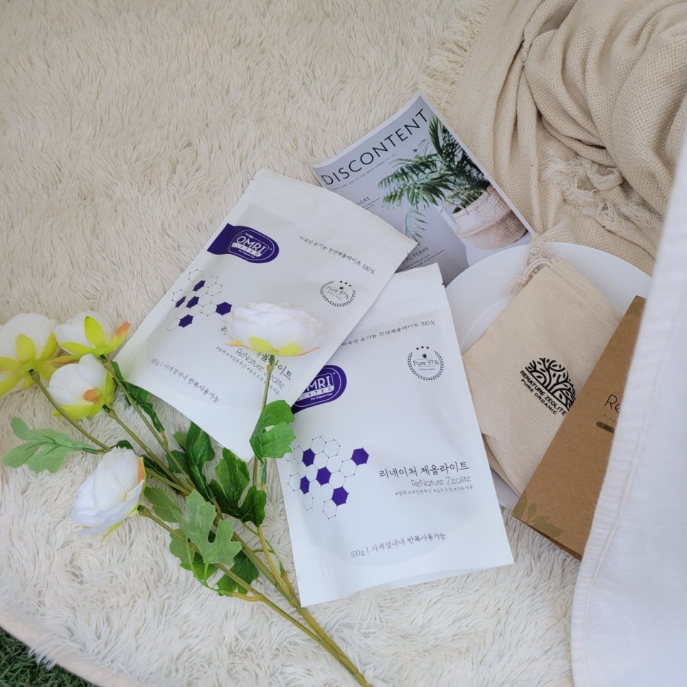 Close-up of a person in a clean bathroom, writing on a paper checklist beside skincare products, sof