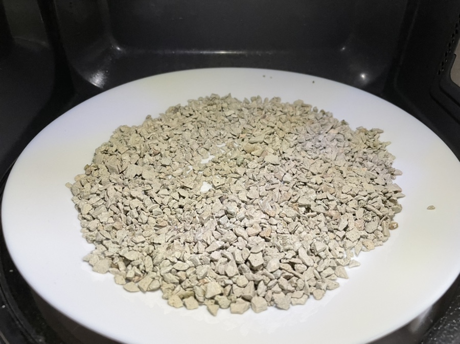 A realistic lab setup showing drying and conditioning of zeolite samples with a convection oven and 