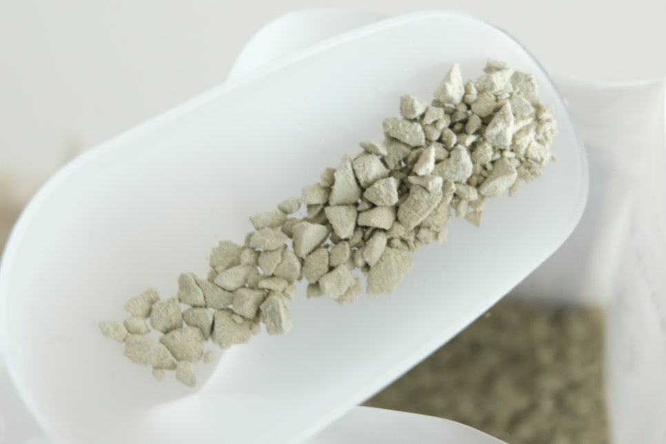 Close-up realistic photo of soil testing activity: soil samples, pH and EC measurement tools, a lab