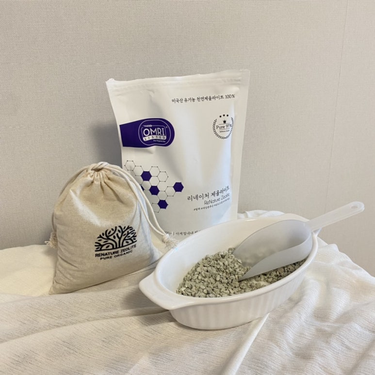 On-site closet test setup with zeolite bags on shelves, a humidity gauge showing a blank display, an